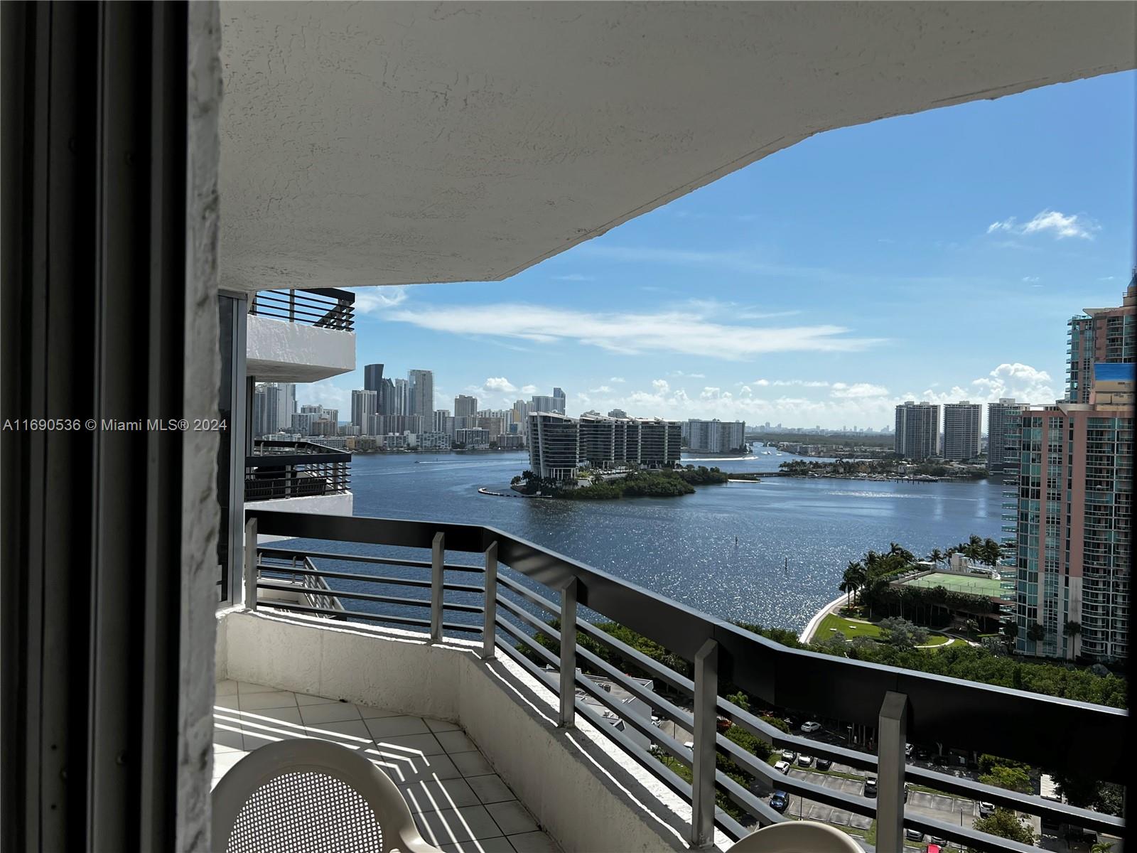 a view of a balcony with city view