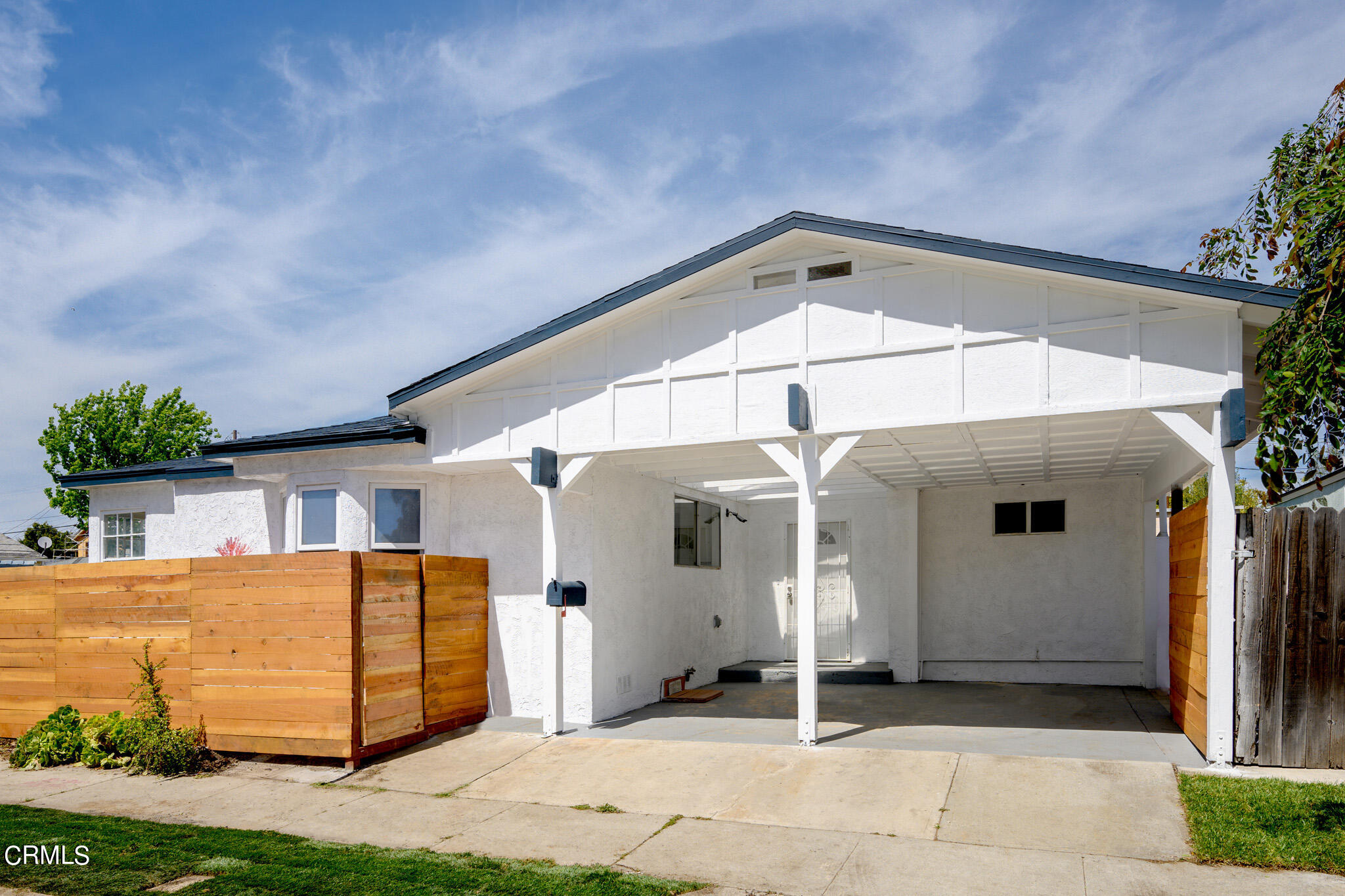 a front view of a house with a garage