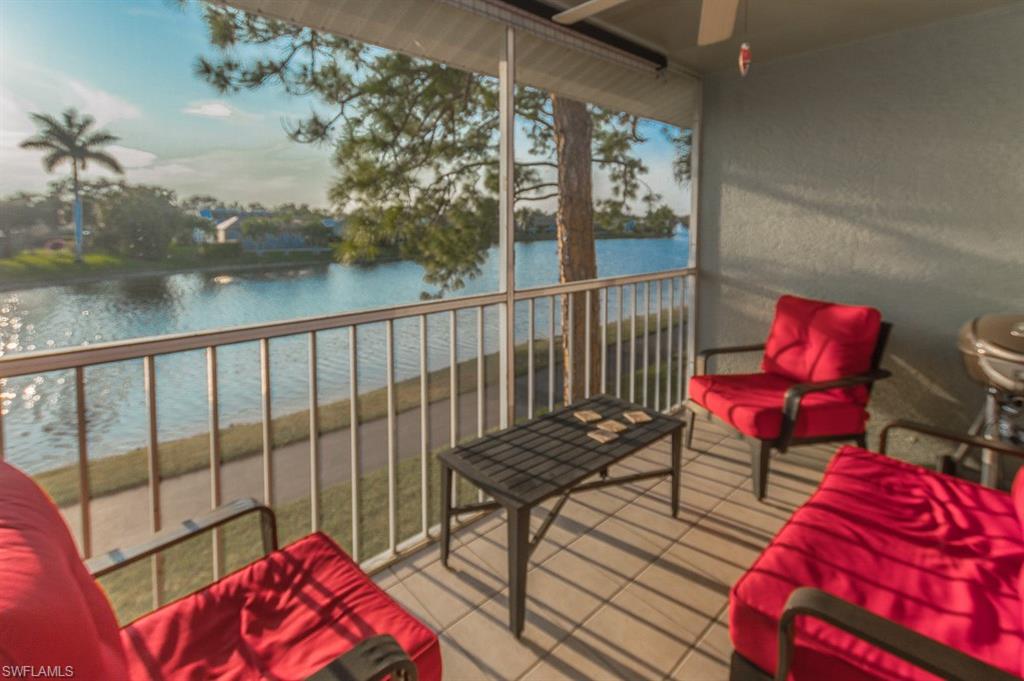 a view of a balcony with chairs