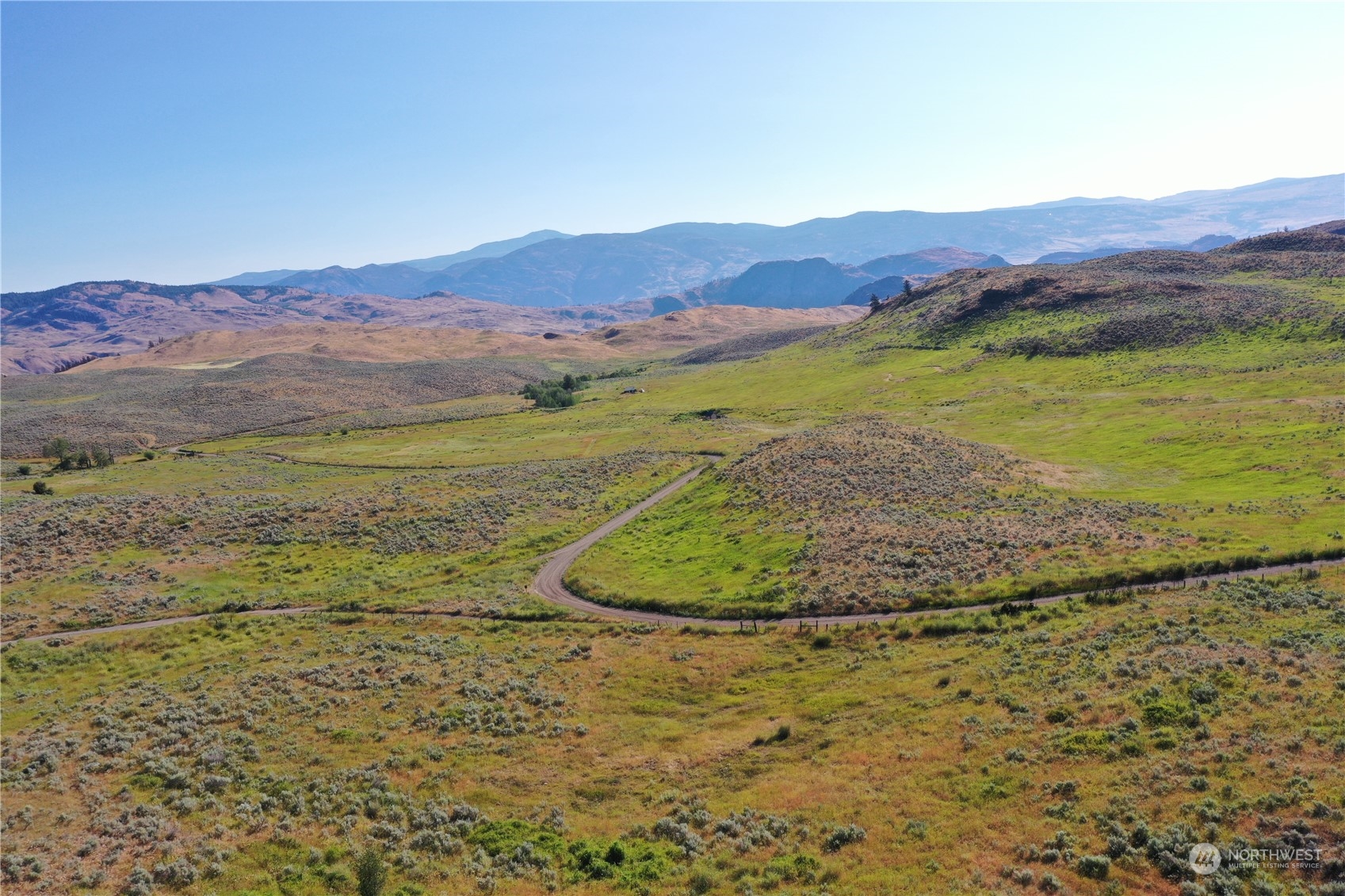 a view of a mountain with an outdoor space