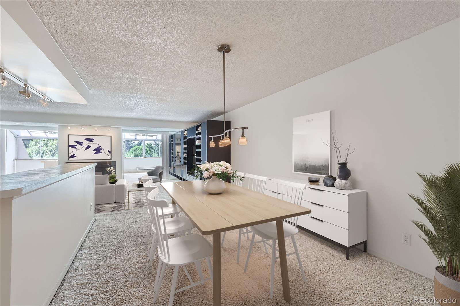 a view of a dining room with furniture