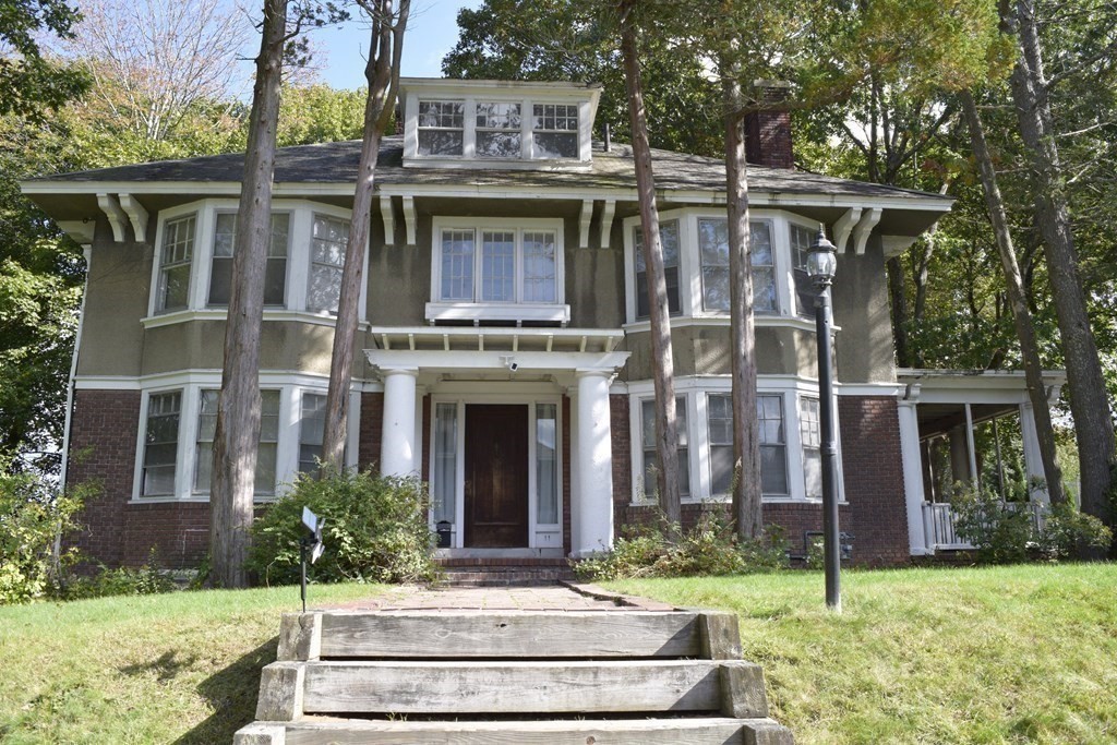 front view of house with a yard