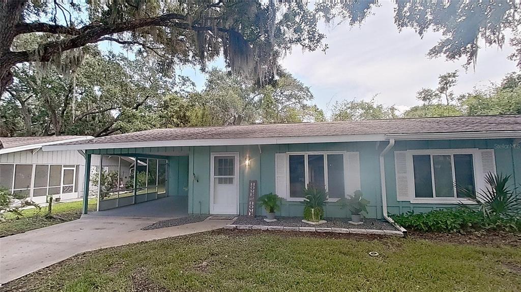 front view of house with a yard