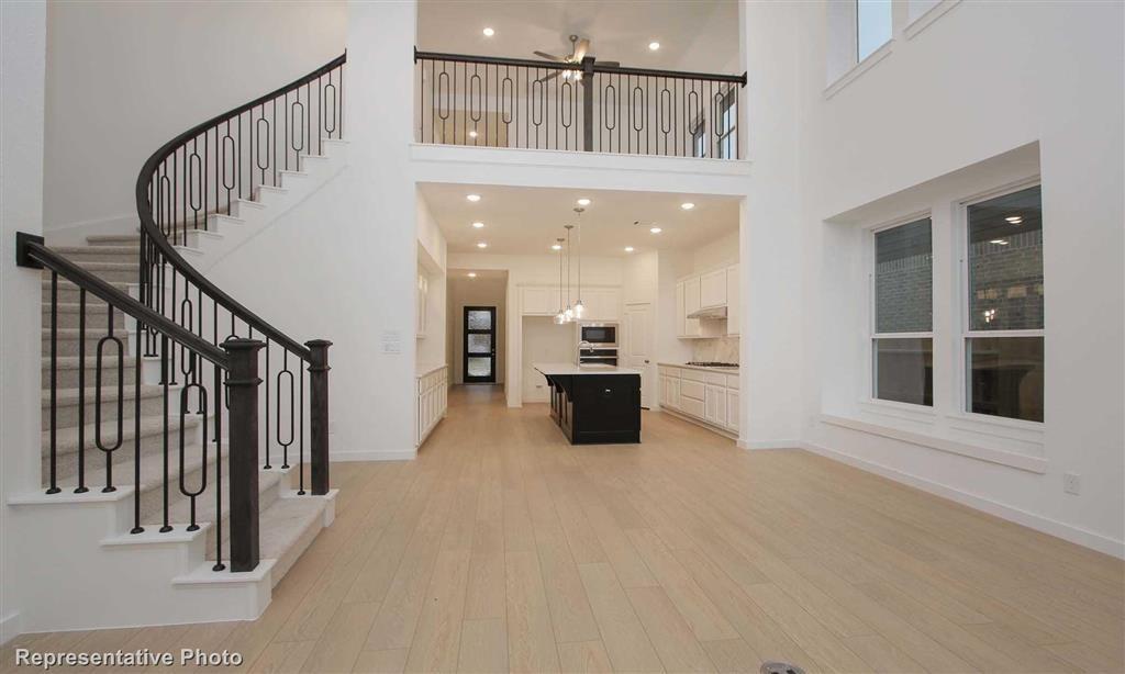 a view of a hallway view with staircase