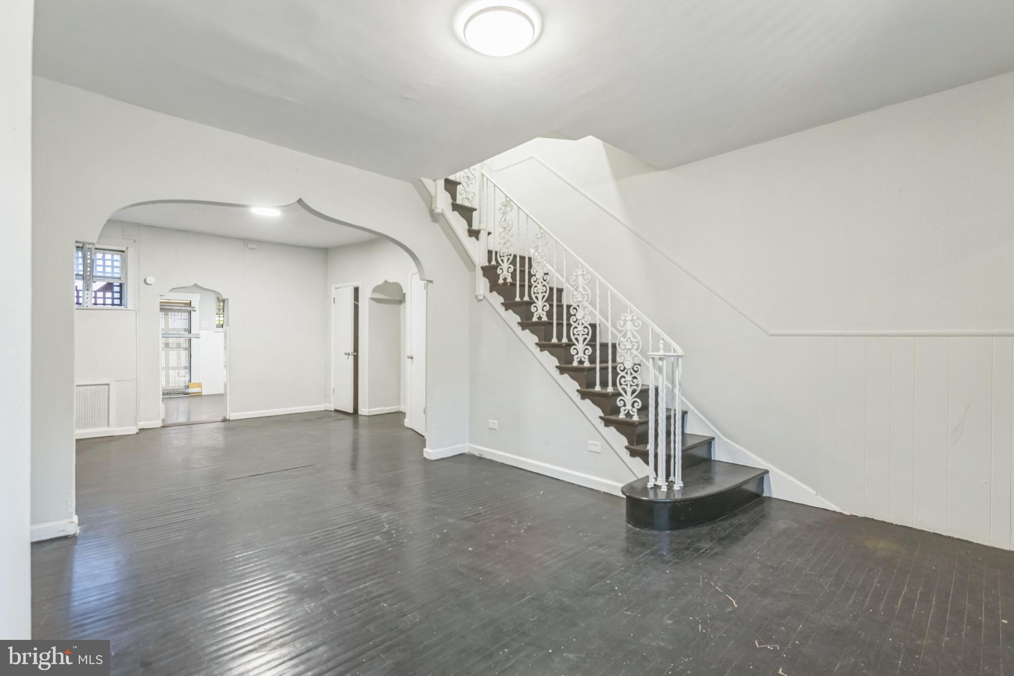 a view of a hallway with staircase