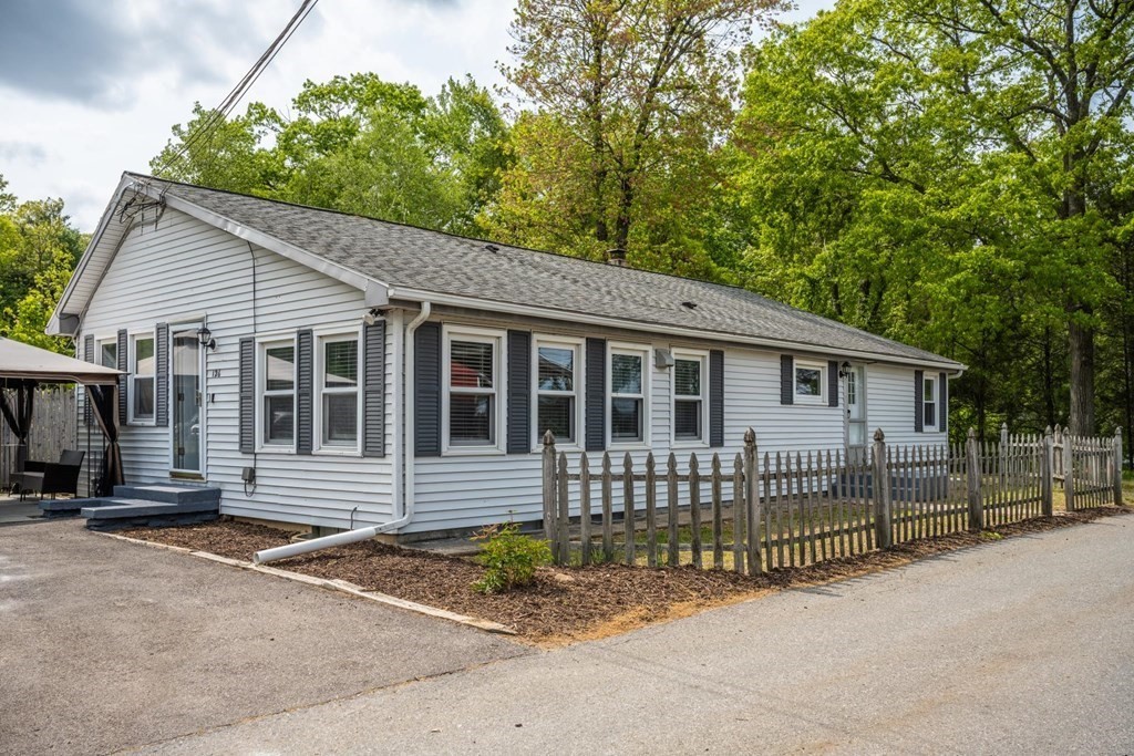 a front view of a house with a garage