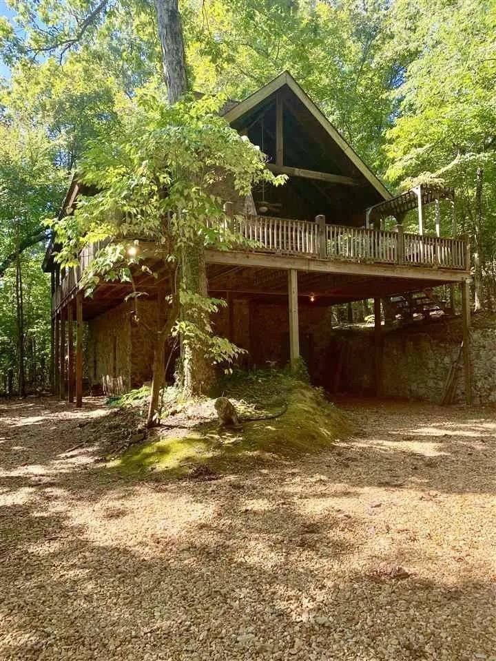 View of home's exterior with a deck