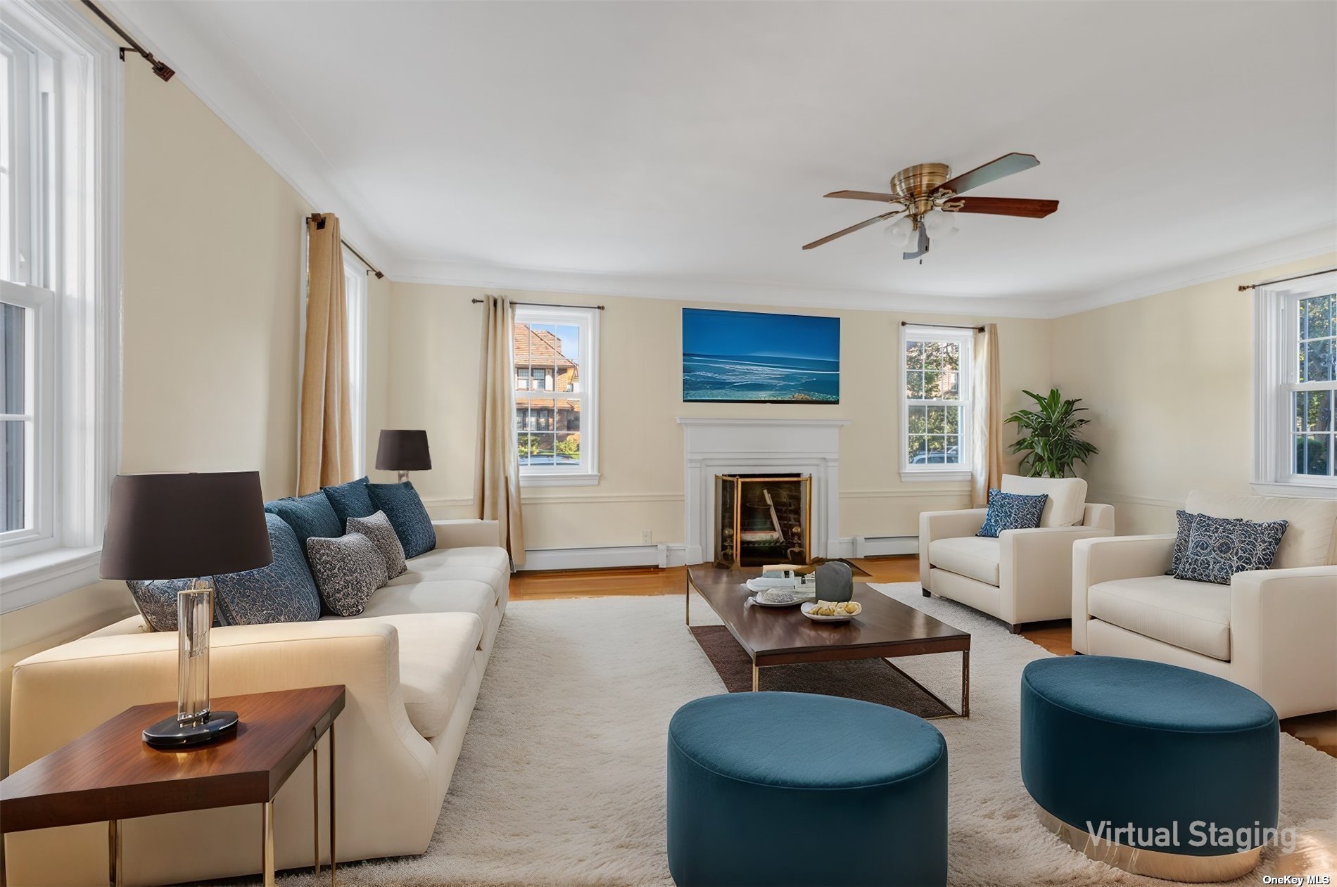 a living room with furniture a fireplace and a flat screen tv