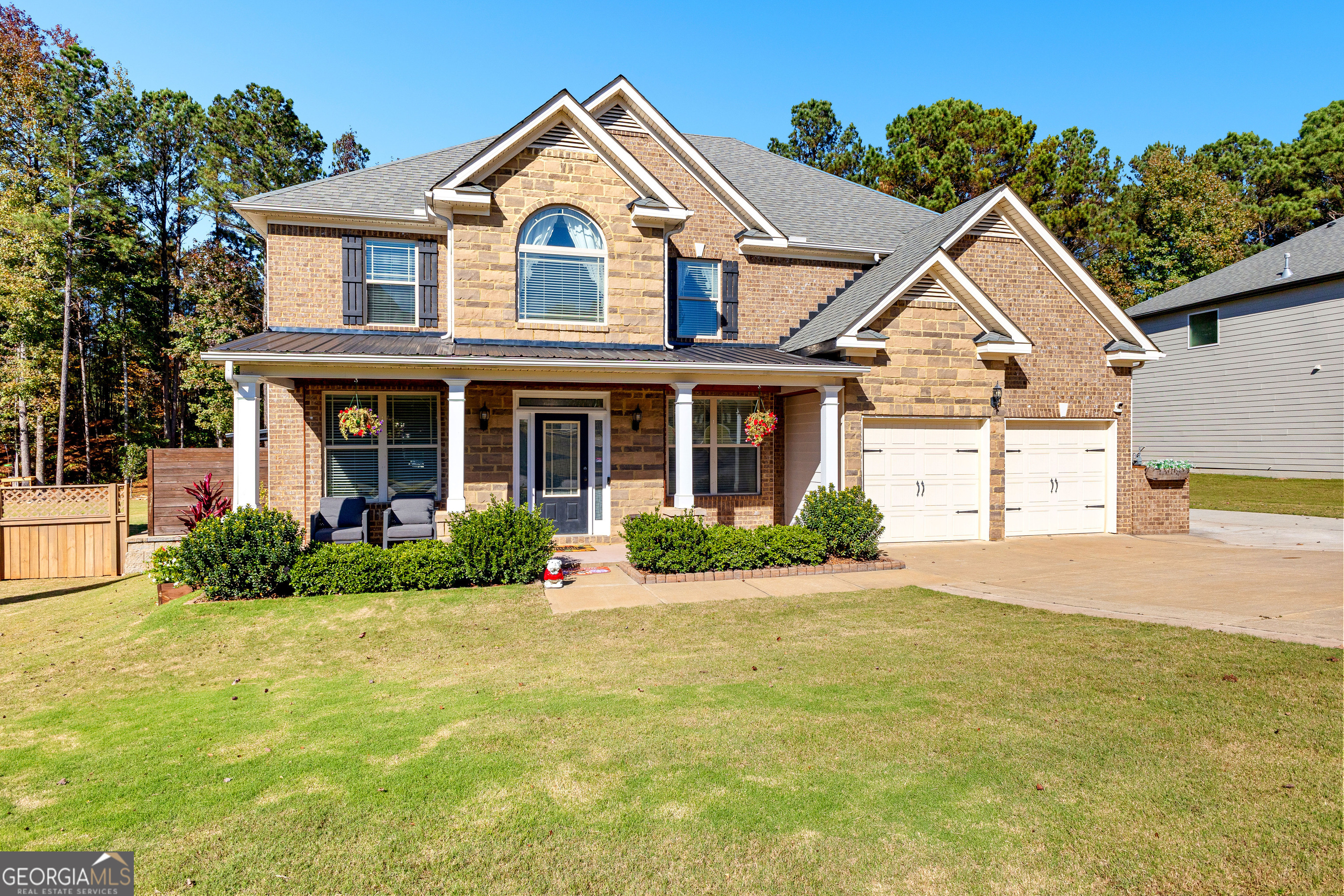 a front view of a house with yard