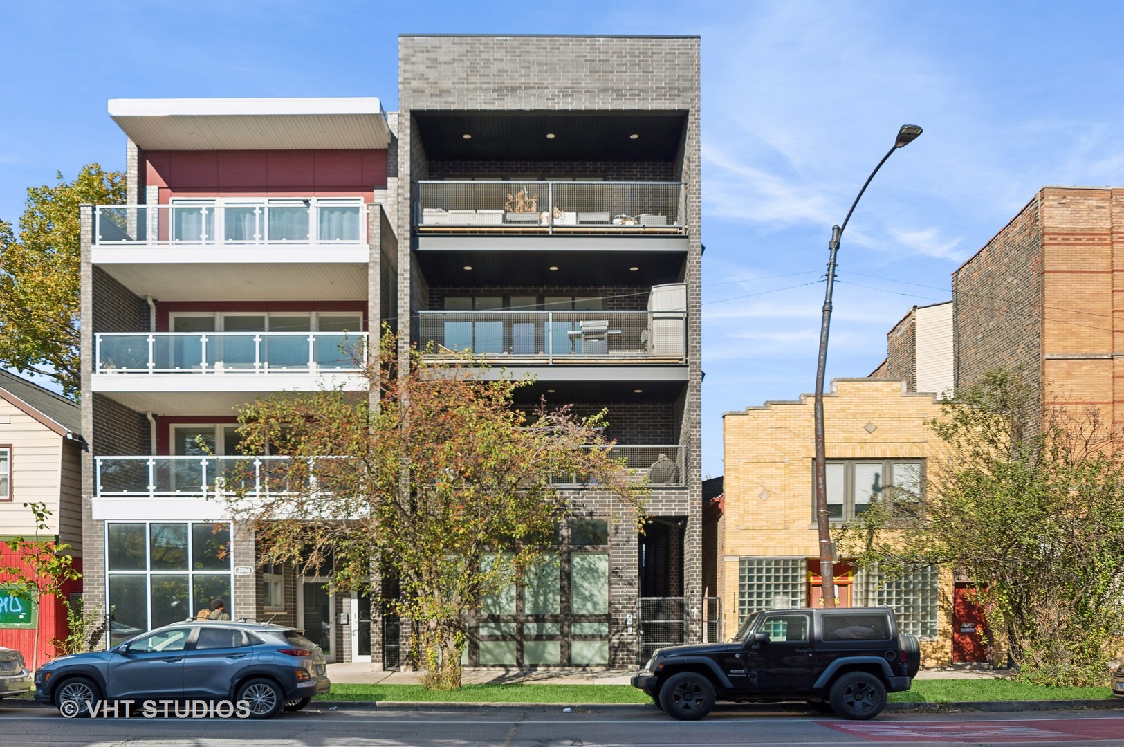 a view of a building and car parked