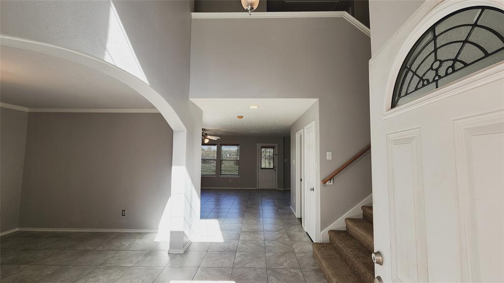 a view of a hallway with entryway