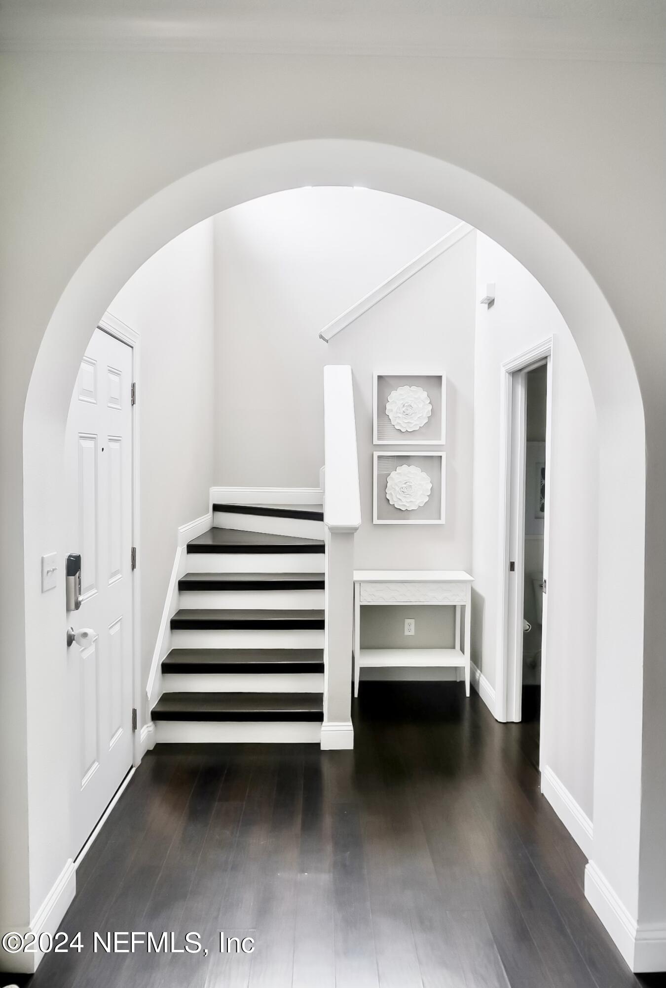 a view of entryway with stairs