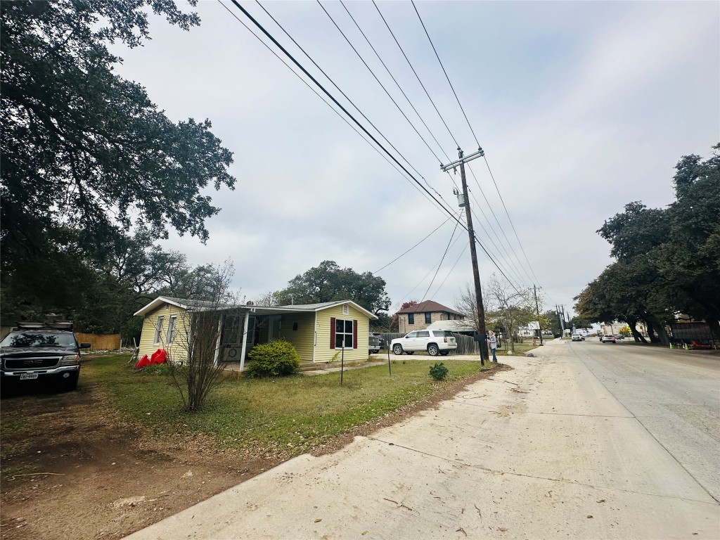 a view of a parked cars in front of a house