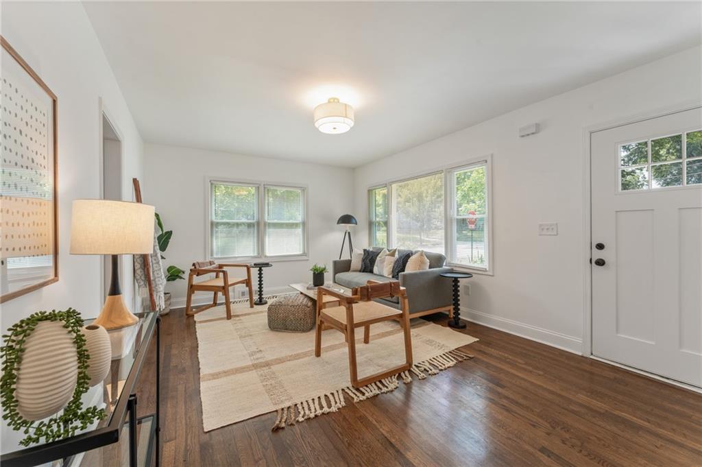 a living room with furniture and a window