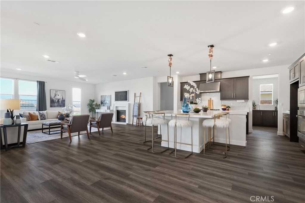 and a kitchen open to both the dining and living room...