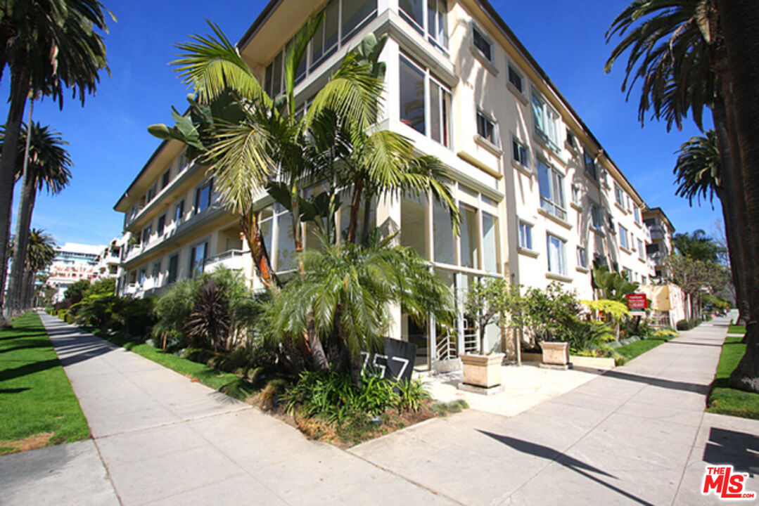 a view of a building with a street