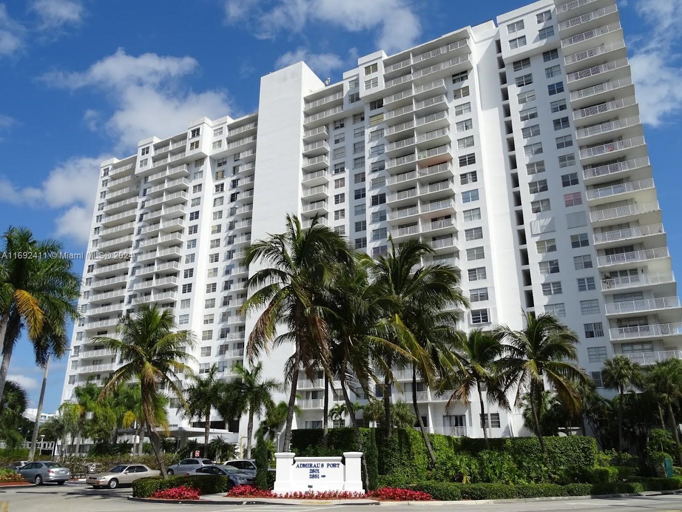 a view of a city with tall buildings