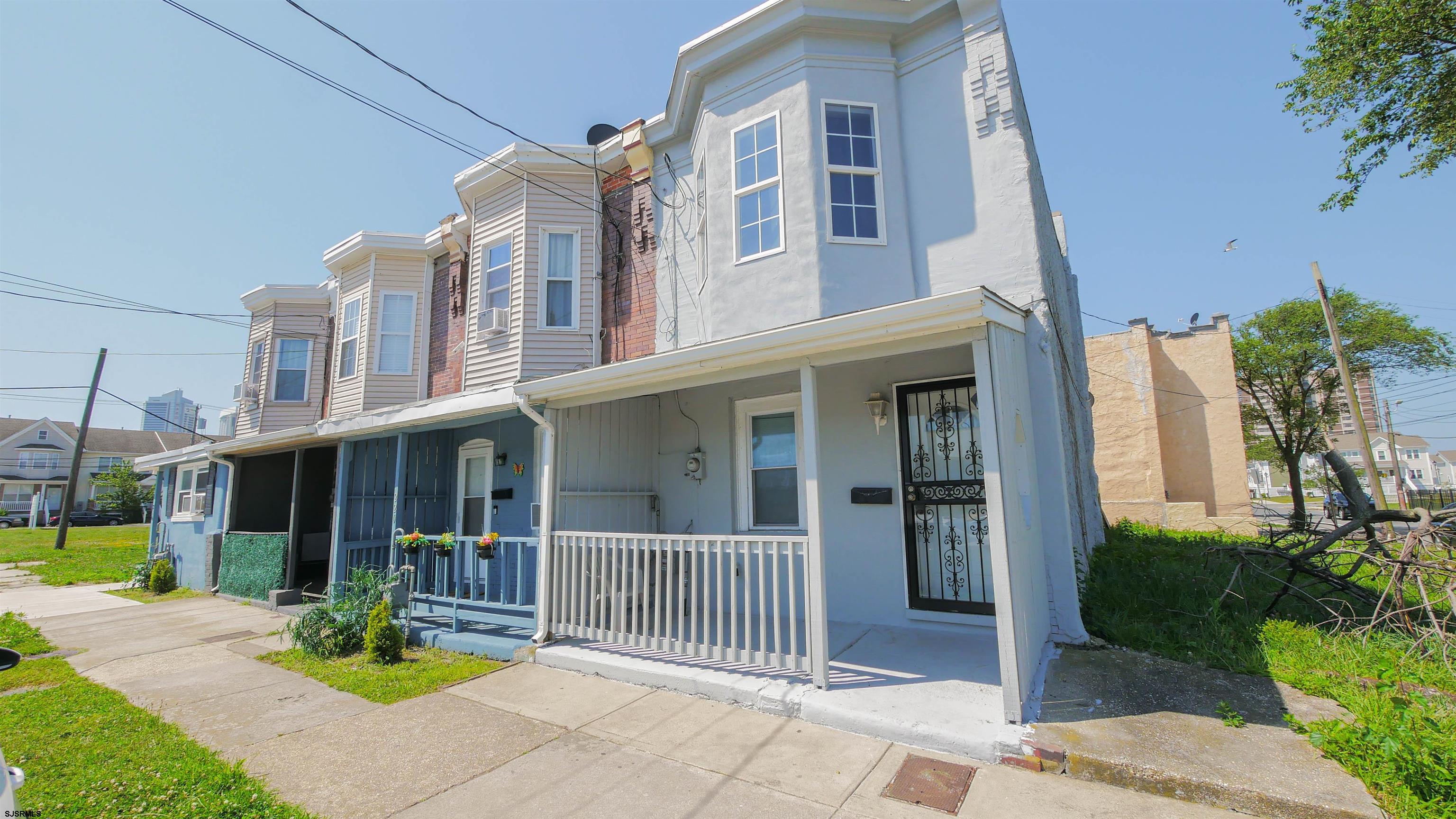 a view of a building with a porch