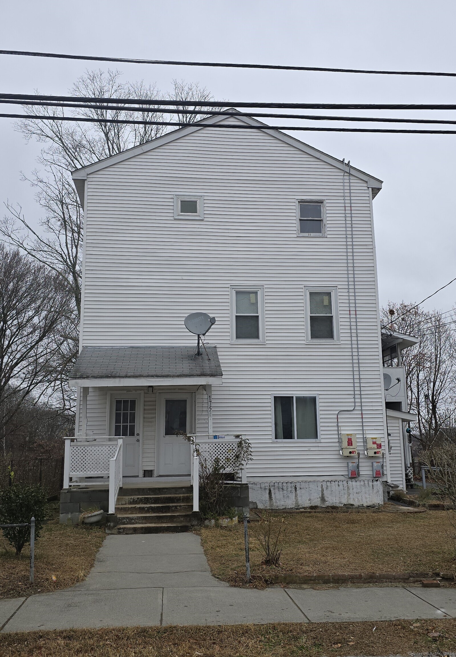 a front view of a house with a garage