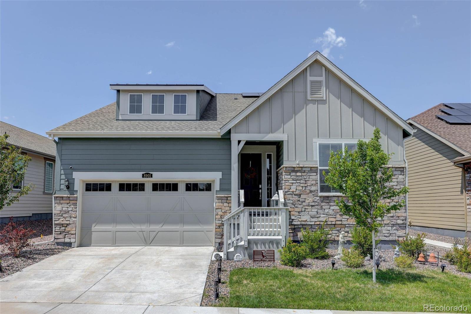 a view of house with backyard