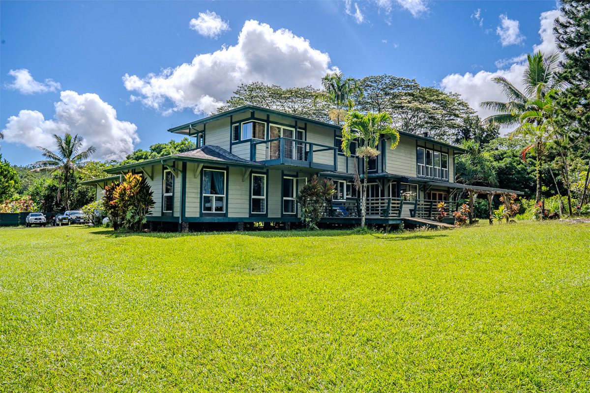 a view of a house with a swimming pool