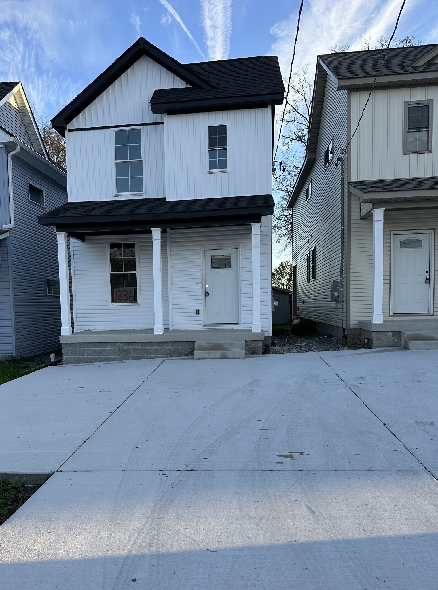 a front view of a house with a garage