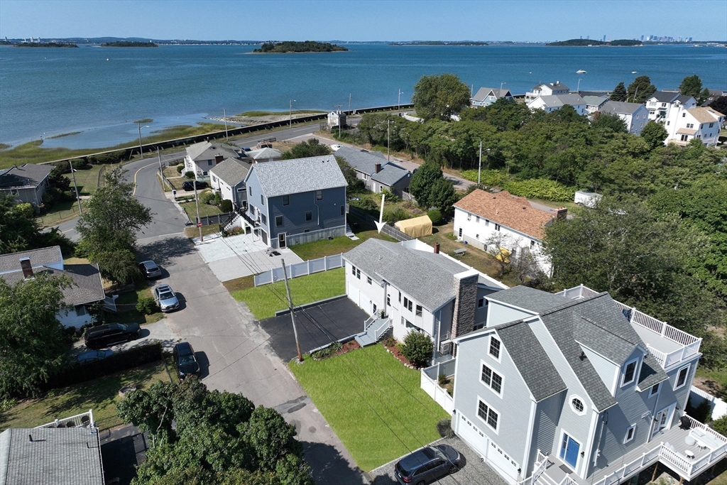 an aerial view of a house with a garden