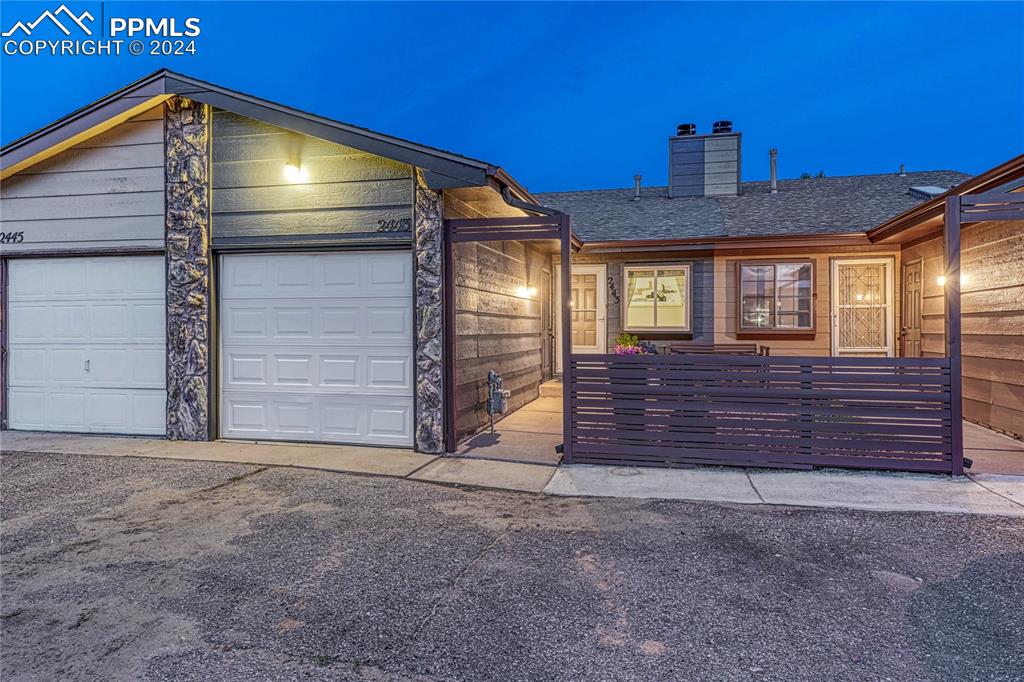 a view of a house with a garage