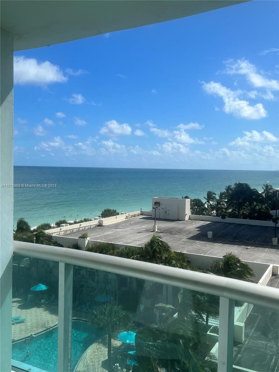 a view of a lake from a balcony