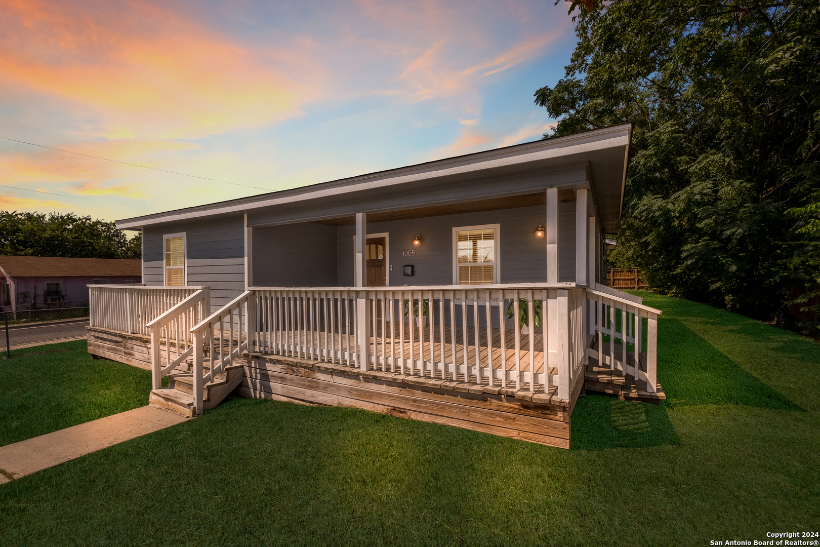 a view of backyard with deck