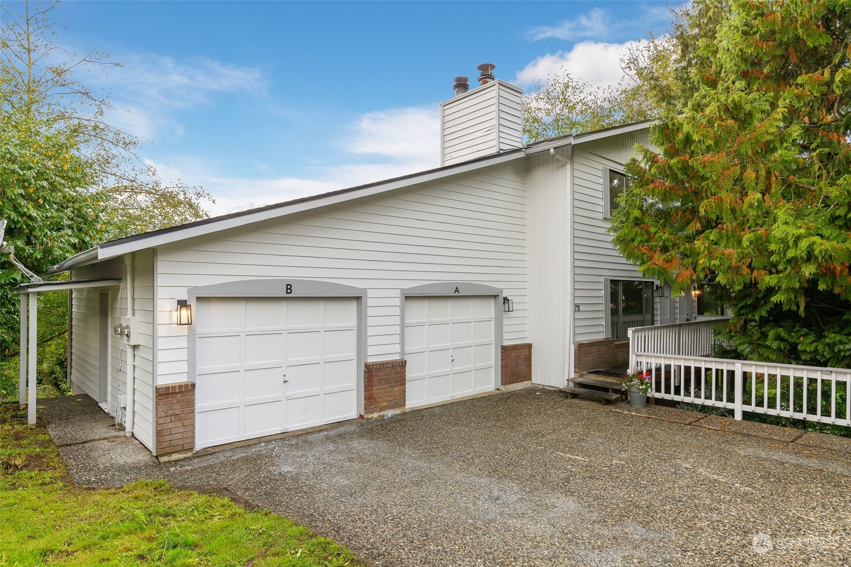 a view of a house with a garage