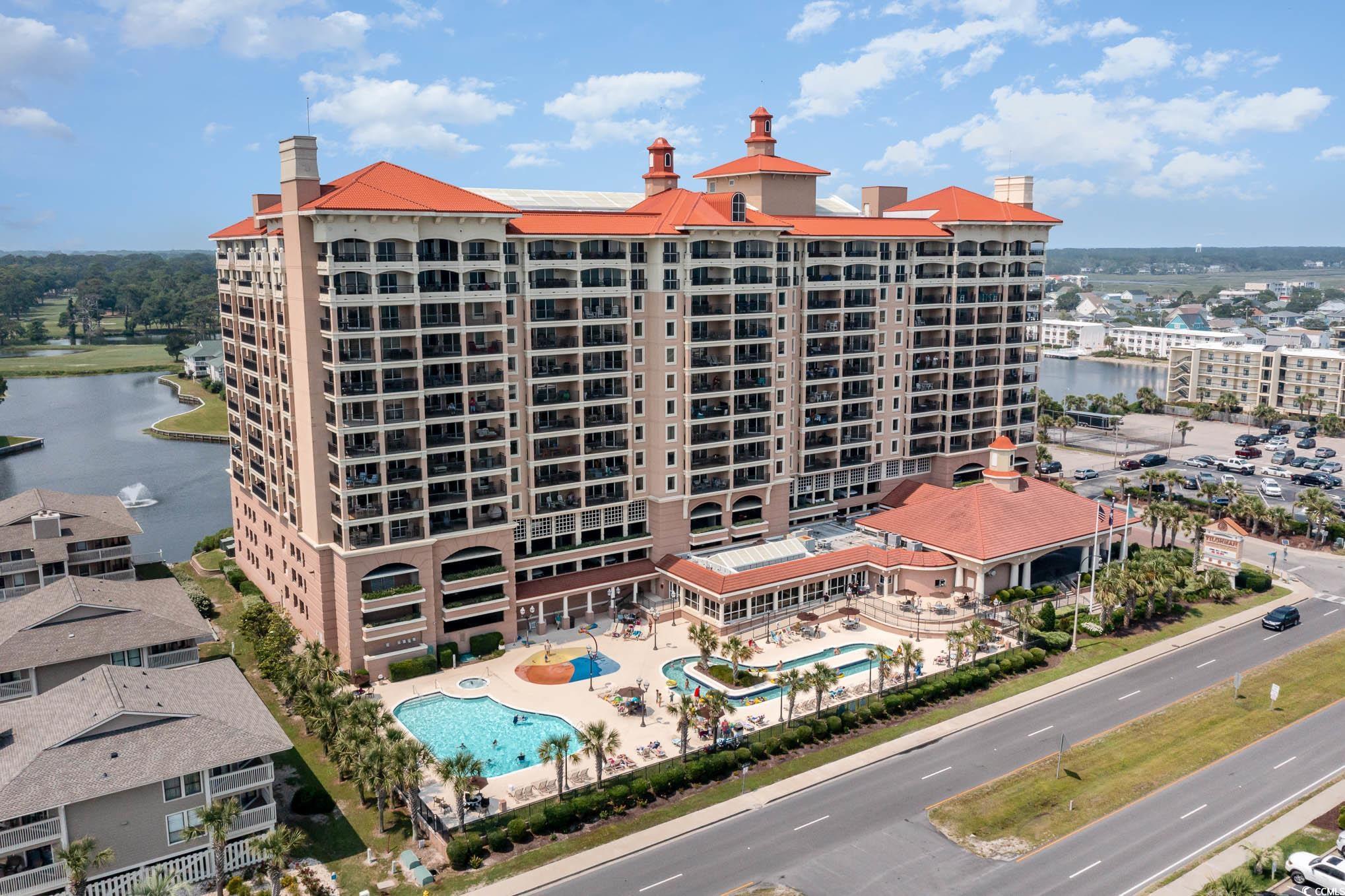 View of building exterior featuring a water view