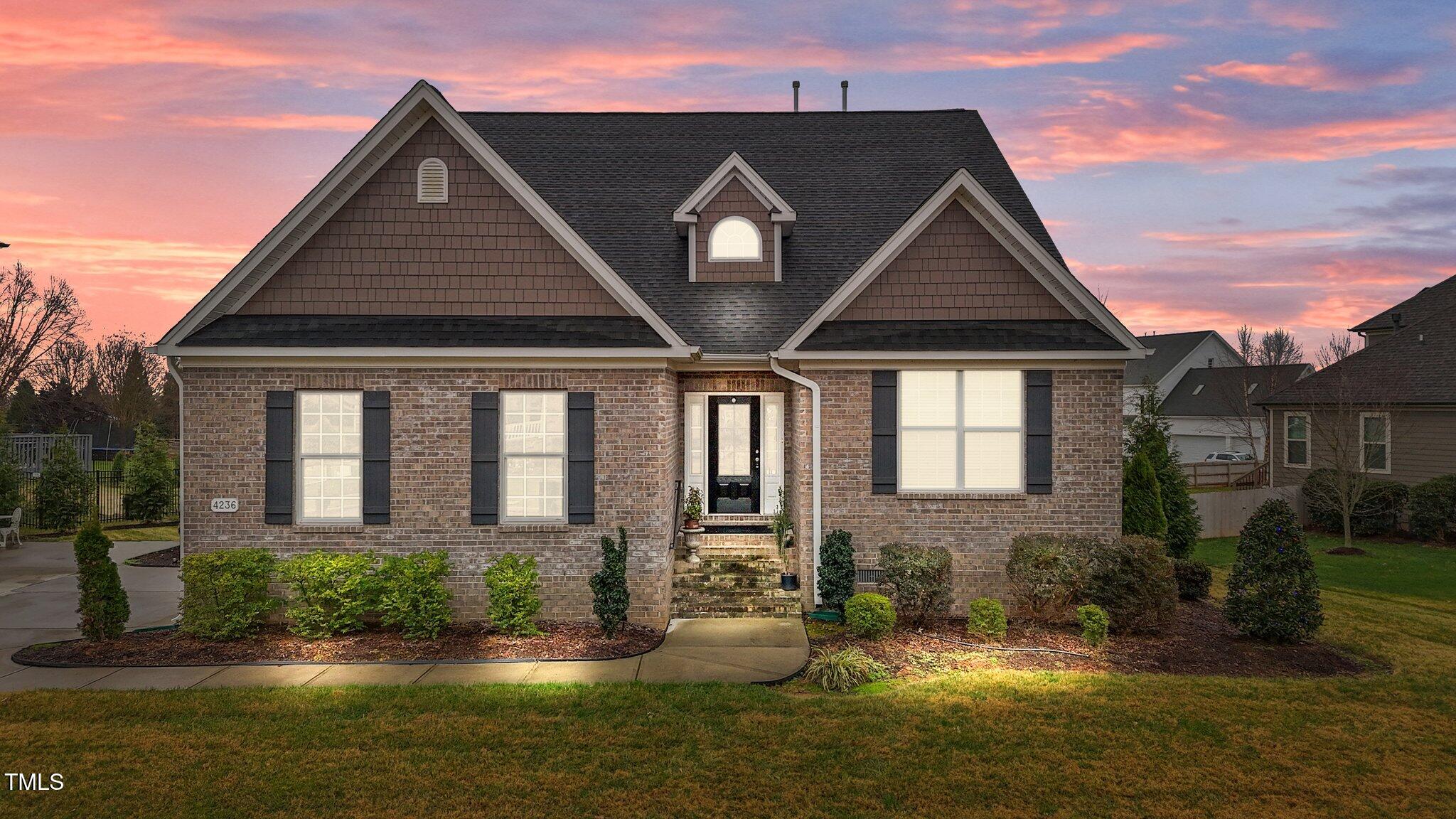 front view of a house with yard