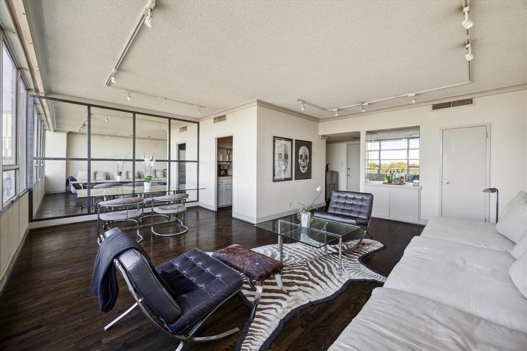 a living room with furniture and a table