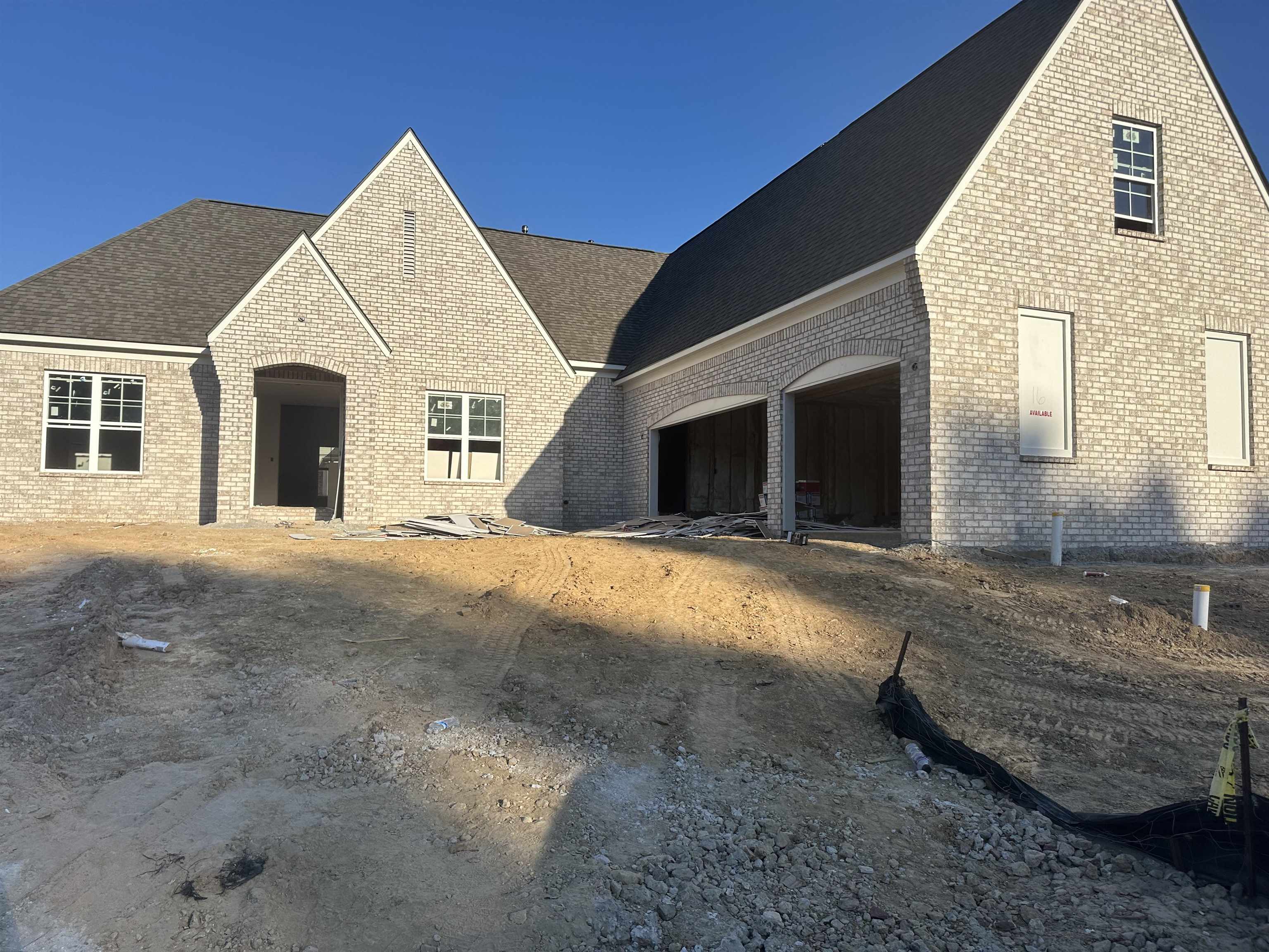 View of front facade featuring a garage