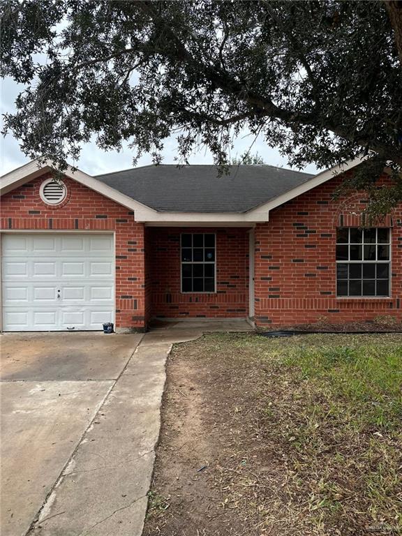 Ranch-style home with a garage