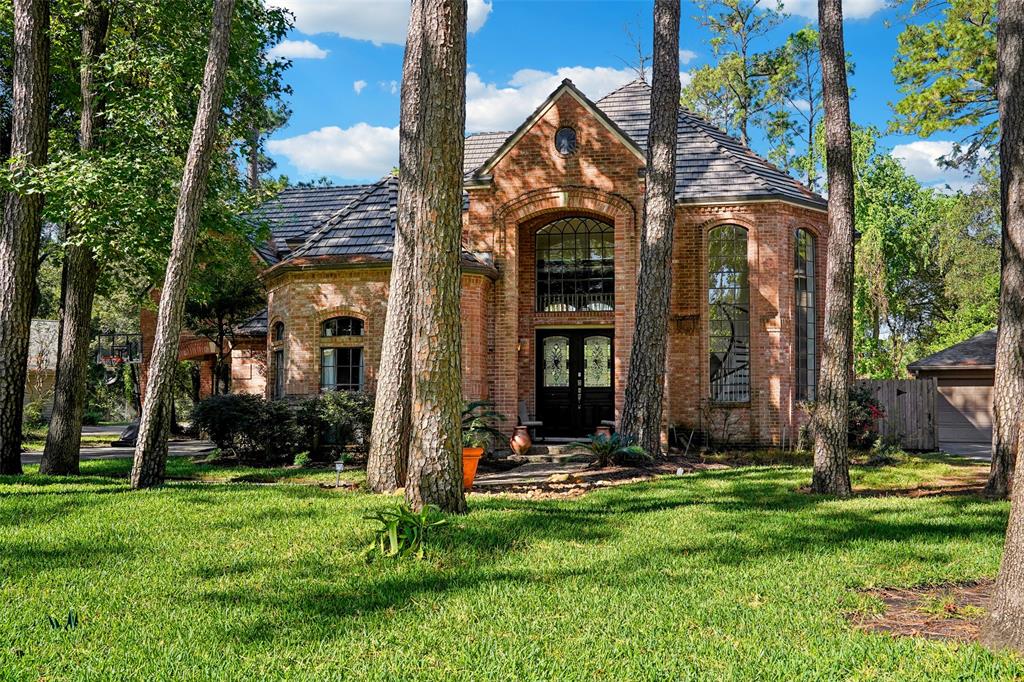 front view of house with a yard