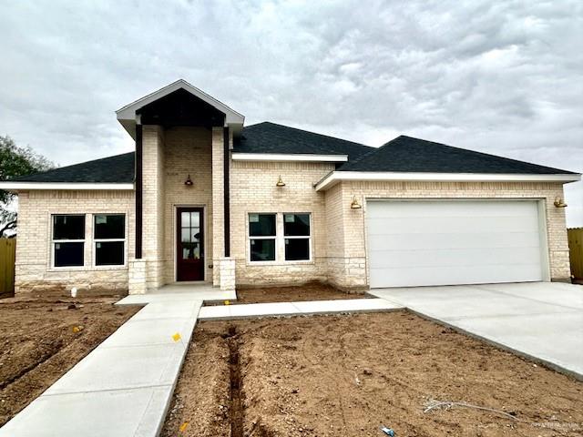 View of front of home with a garage