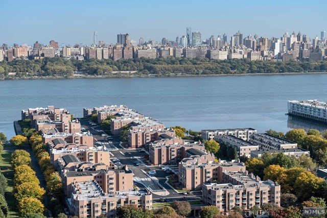 a view of a city with tall buildings