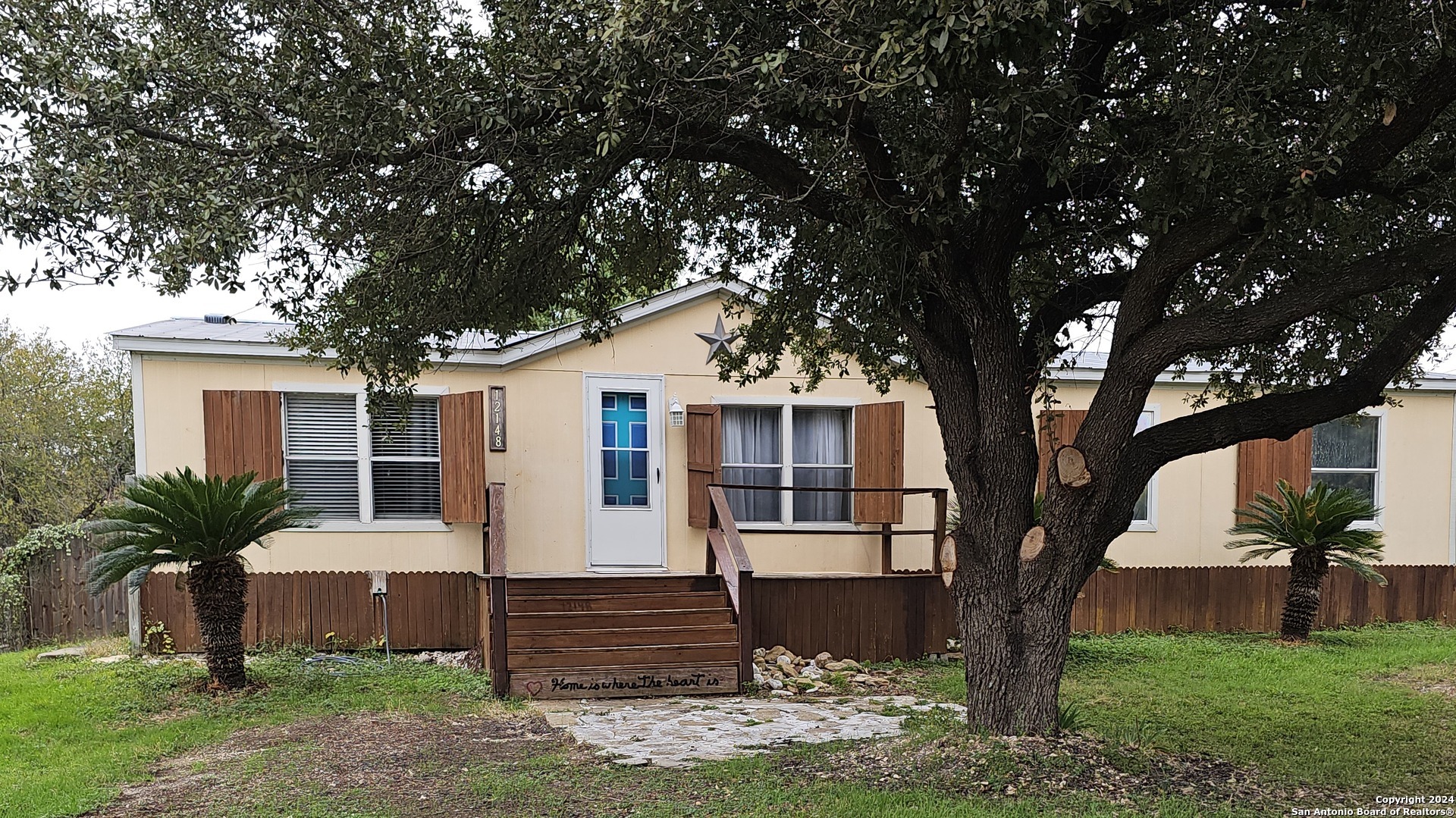 a front view of house with yard