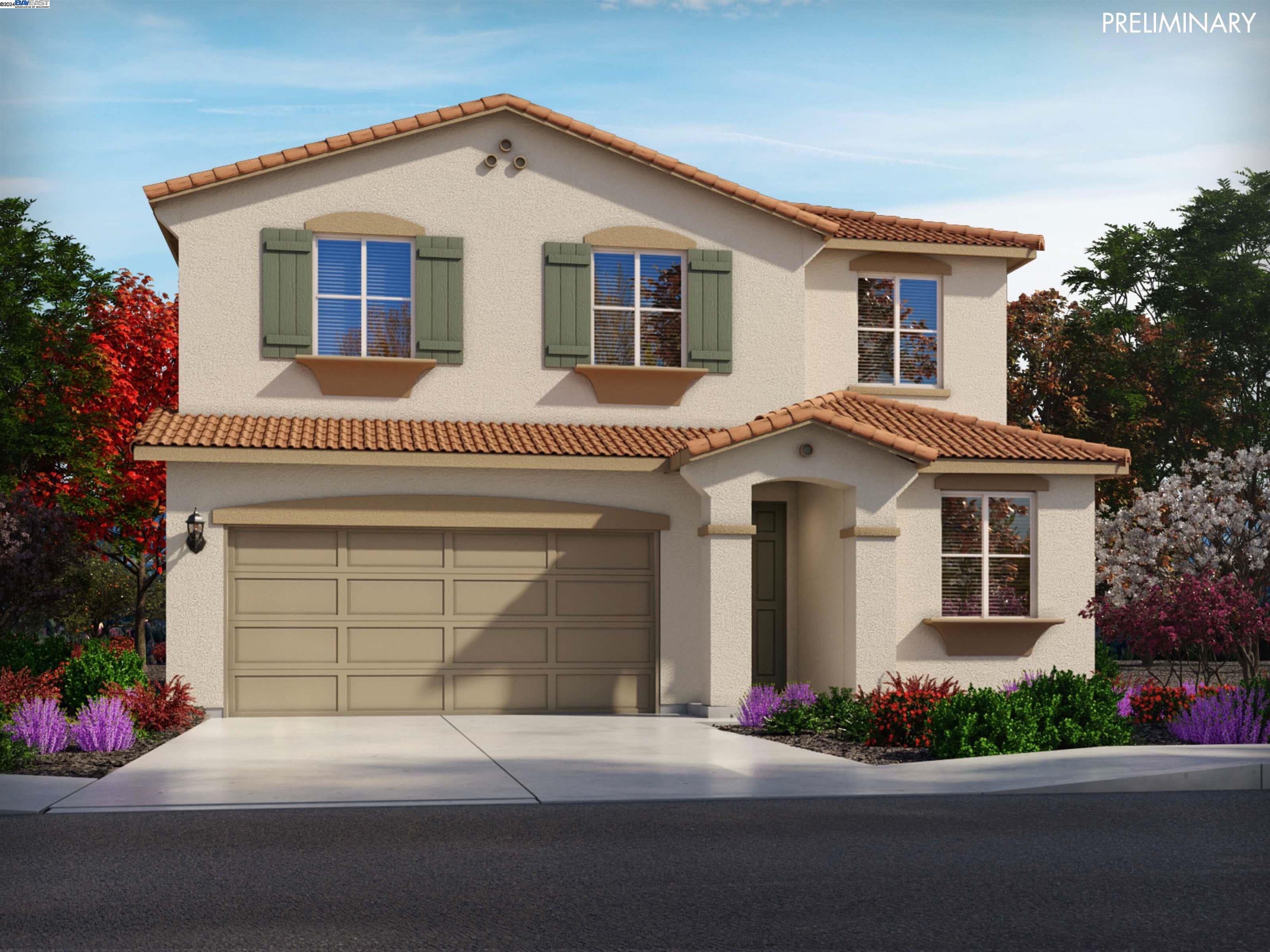 a front view of a house with a garage