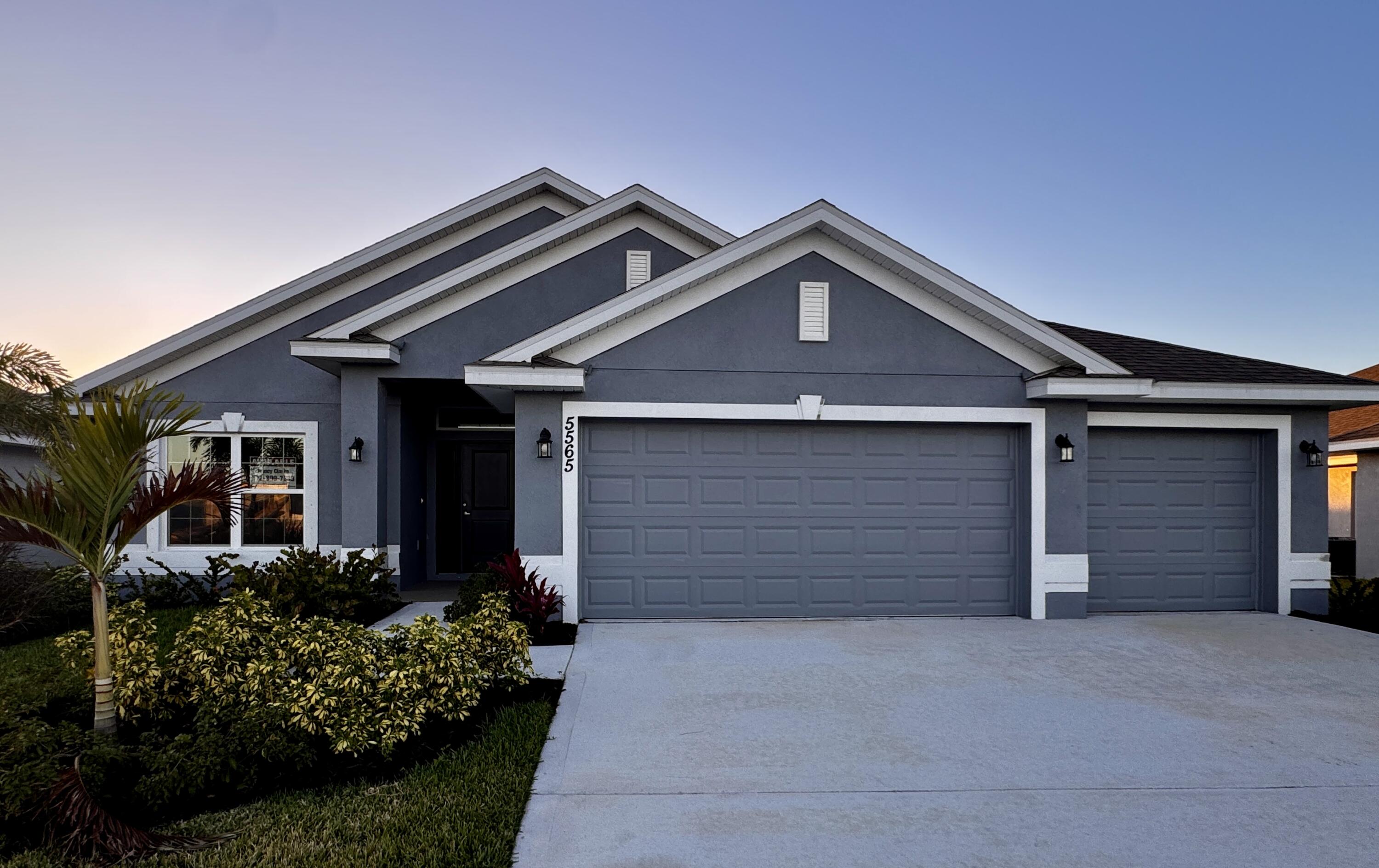 front view of a house with a garage