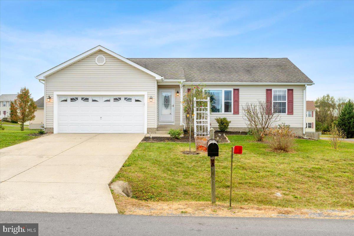 a front view of house with yard