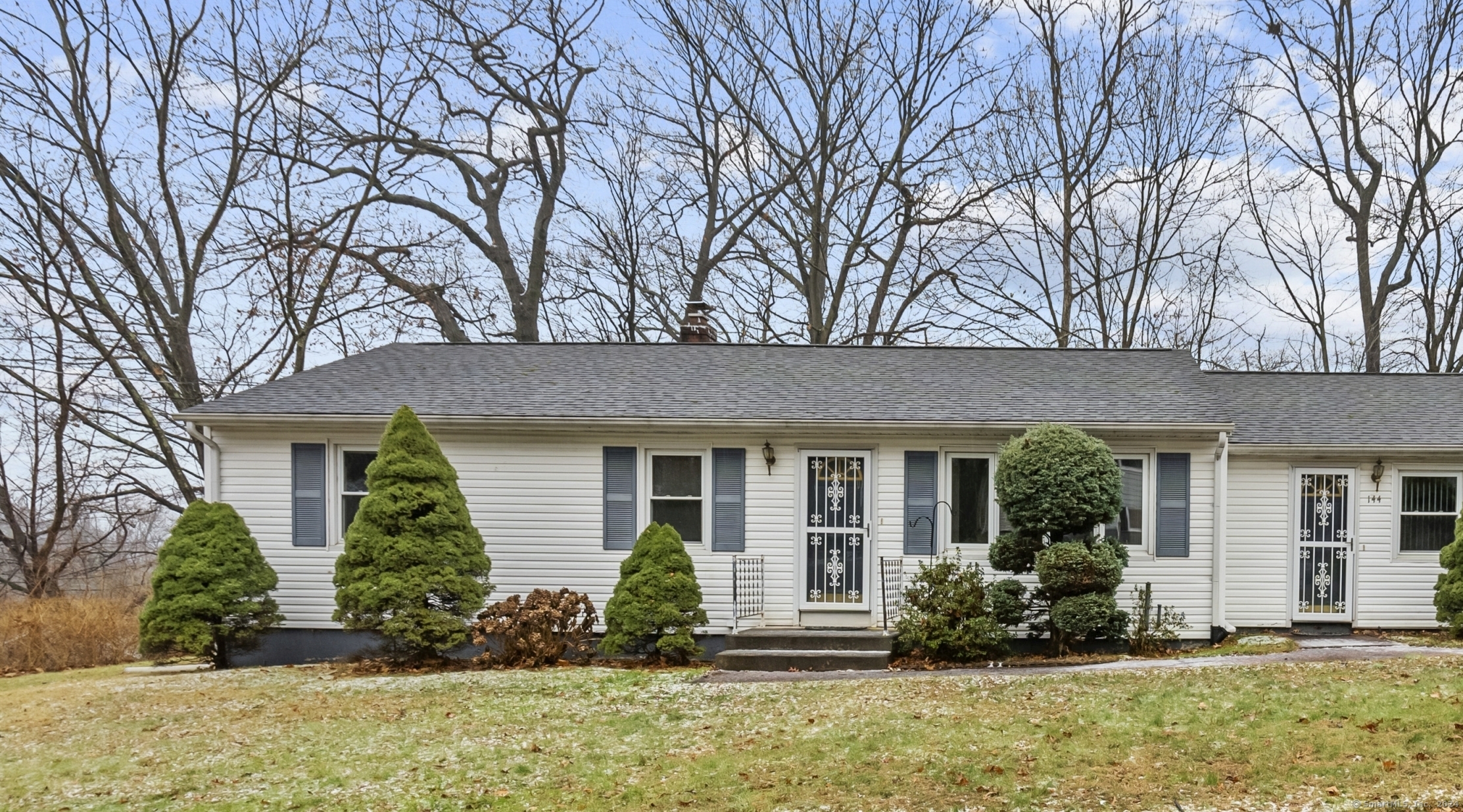 front view of house with a yard