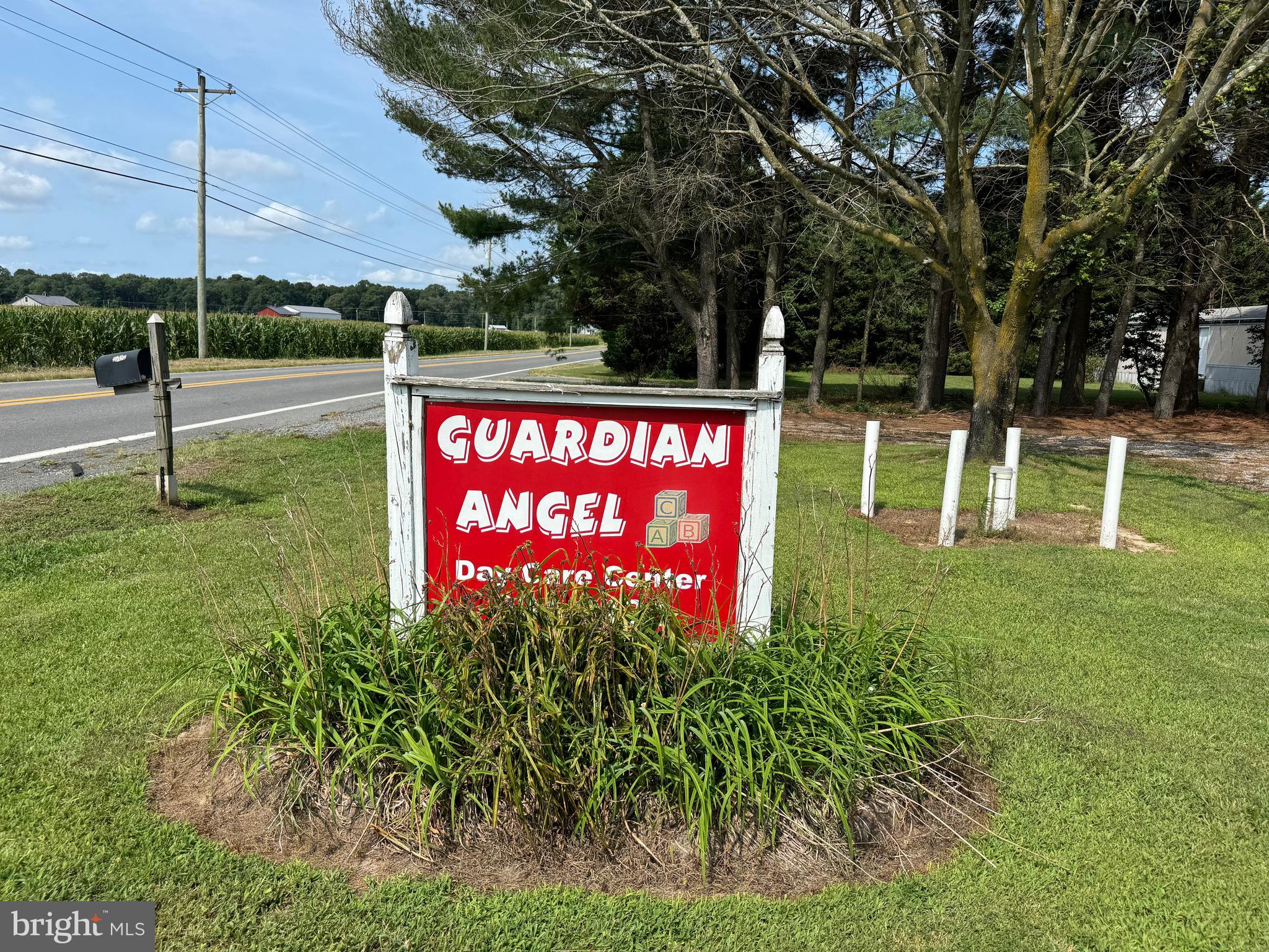 a sign that is sitting in the grass