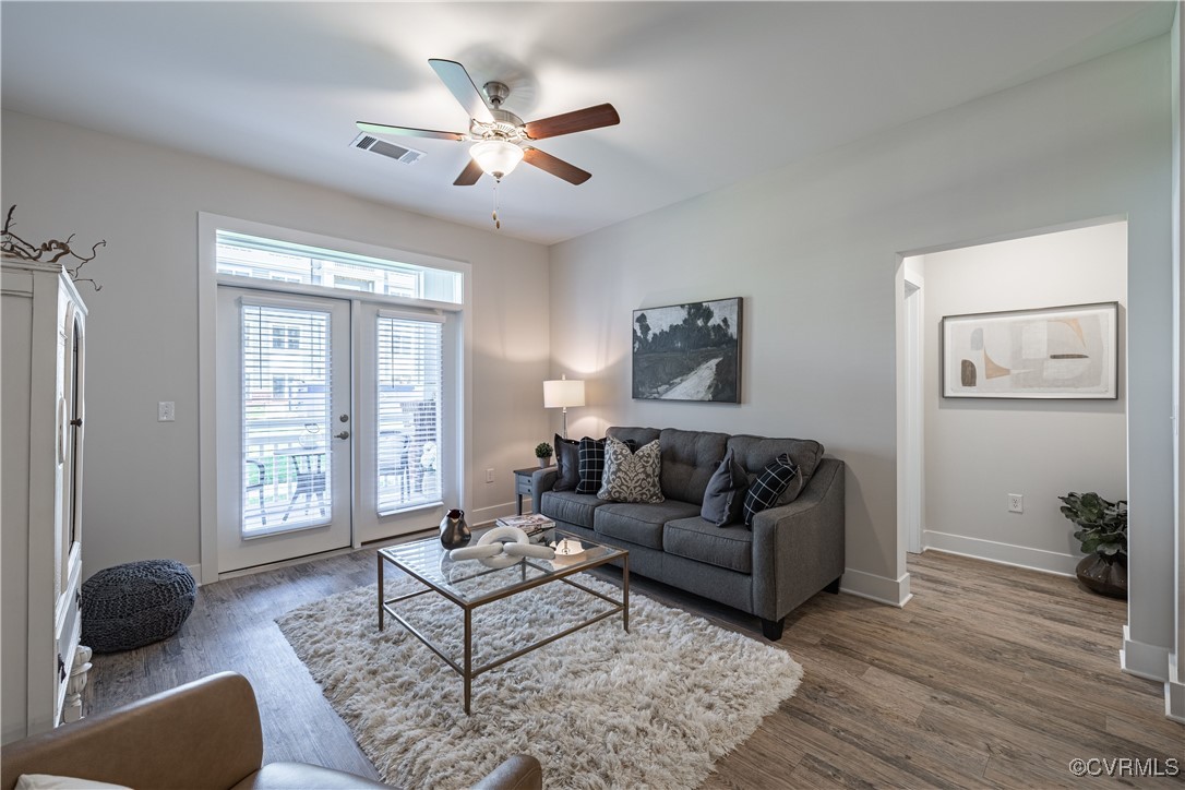 a living room with furniture and a window