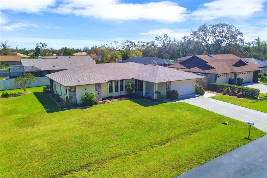 a view of a house with a big yard