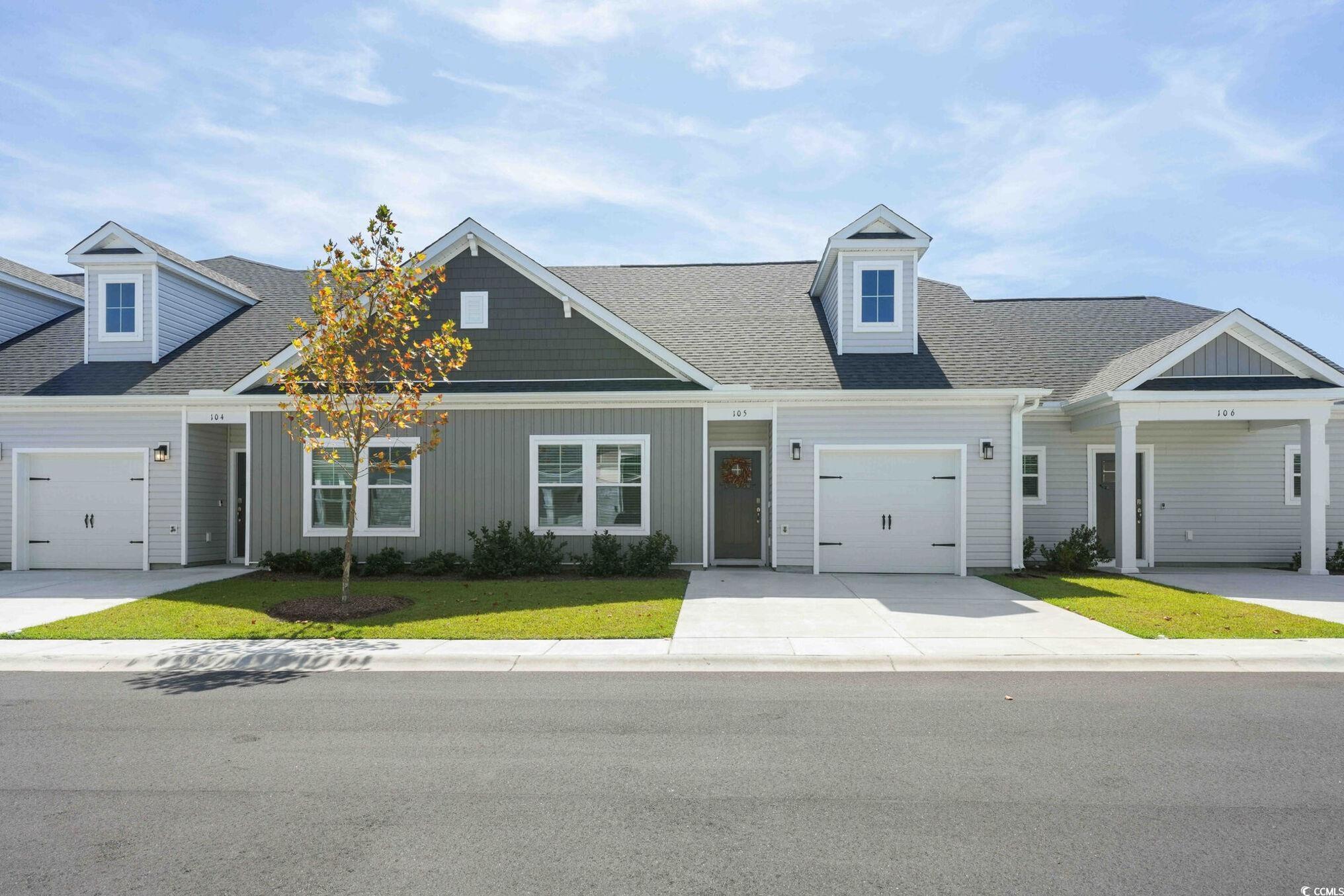 View of front of home featuring a front lawn