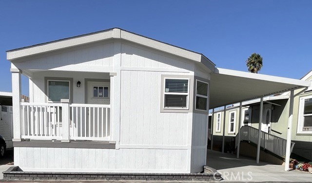 a front view of a house with a porch