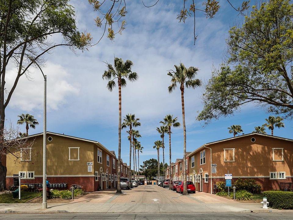 a view of a street with a building in the background